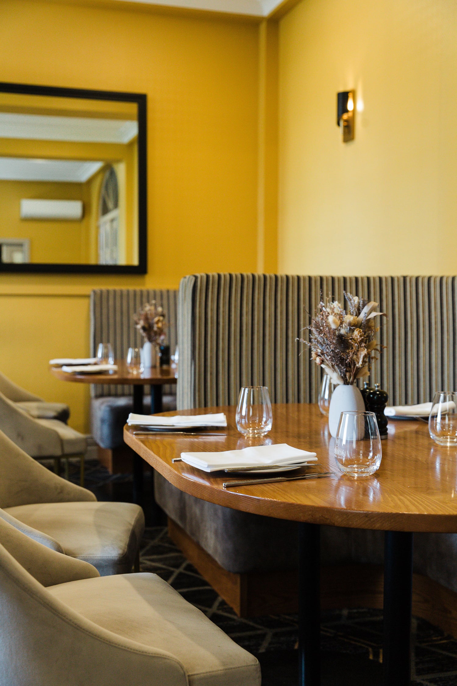 The interior of Mission Estate Restaurant showing a table set for lunch guests